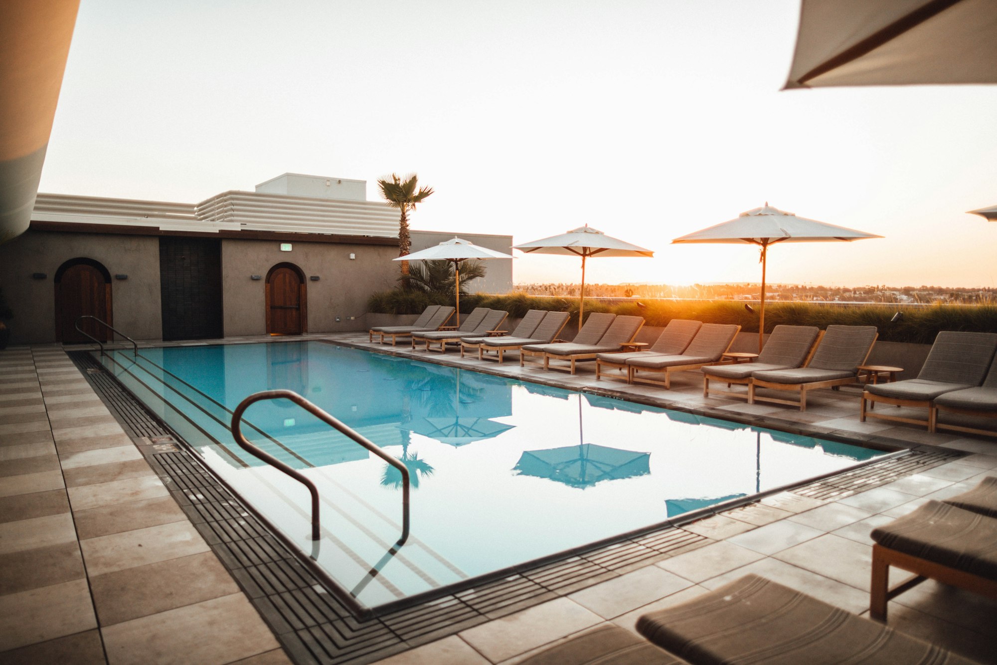 A sparkling swimming pool with clear blue water